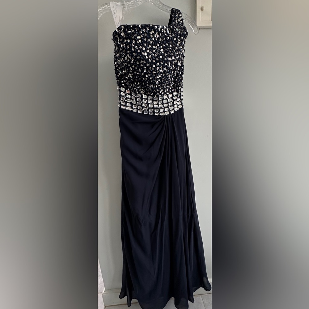 Gorgeous Prom/ ball gown size 4 navy blue with gems across bodice never worn